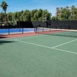 Tennis and basketball courts at The Ranch on a sunny day.