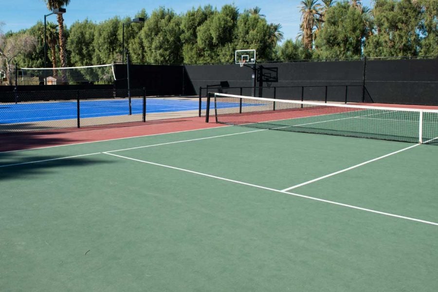 Tennis and basketball courts at The Ranch on a sunny day.