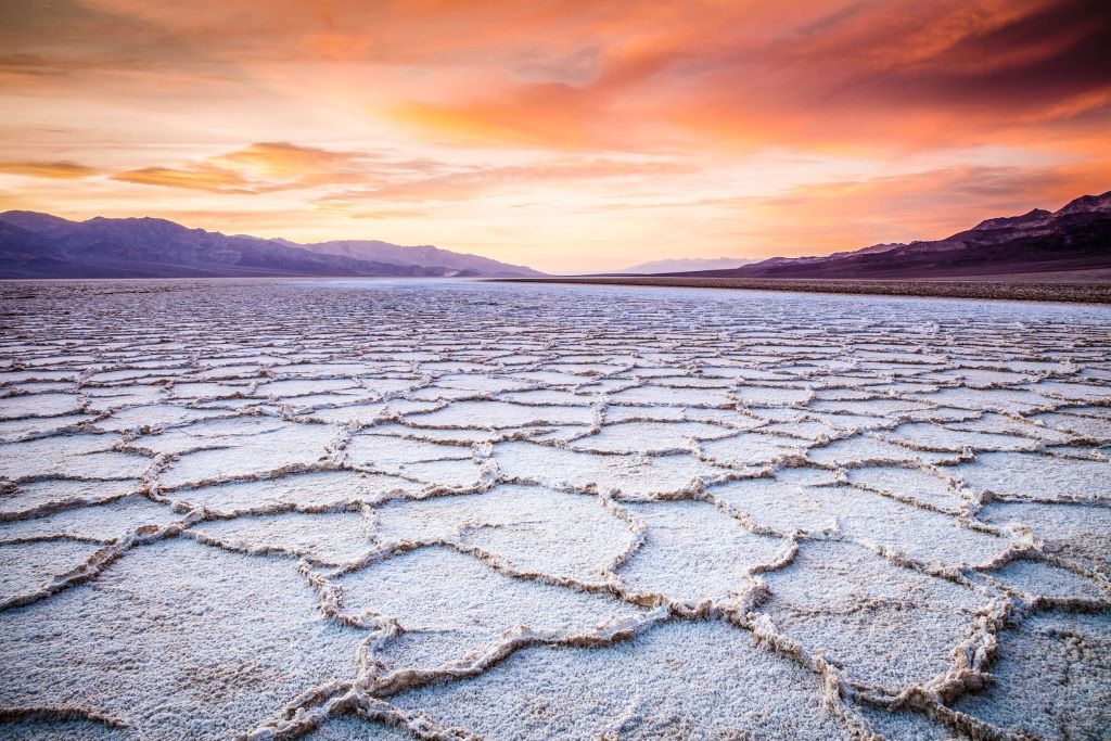The sunsets over the Badwater landscape in Death Valley National Park.