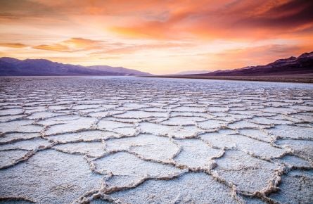 The sunsets over the Badwater landscape in Death Valley National Park.