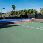 Tennis and basketball courts at The Ranch on a sunny day.