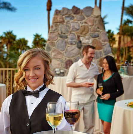 Waitress serving wine at Death Valley
